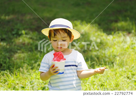 Infant eating shaved ice Infant eating shaved ice 22792774