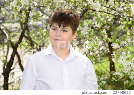 Portrait of a boy teenager on a background of Portrait of a boy teenager on a background of 22798632