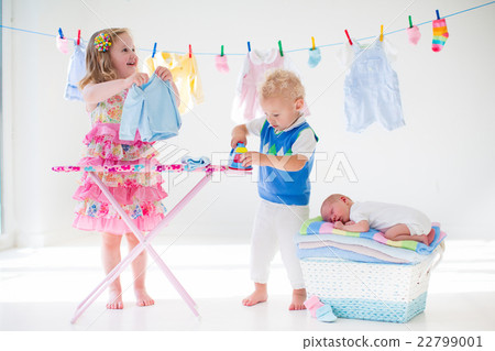 Kids ironing clothes for baby brother Kids ironing clothes for baby brother 22799001
