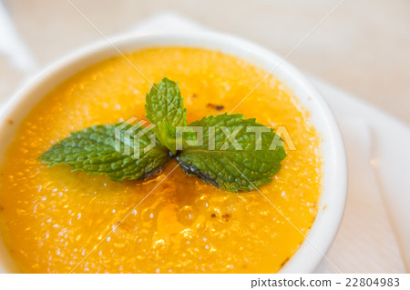 Custard pudding in white plate Custard pudding in white plate 22804983