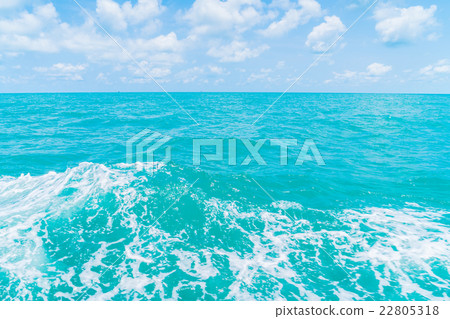 Trail on sea water surface behind boat Trail on sea water surface behind boat 22805318
