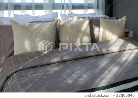 modern bedroom with brown pillows modern bedroom with brown pillows 22806046