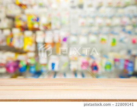 Wooden empty table in front of blurred background Wooden empty table in front of blurred background 22809141