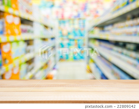 Wooden empty table in front of blurred background Wooden empty table in front of blurred background 22809142