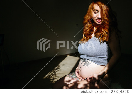 pregnant young woman pregnant young woman 22814808