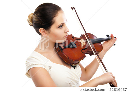 Beautiful young woman playing violin over white 22816487