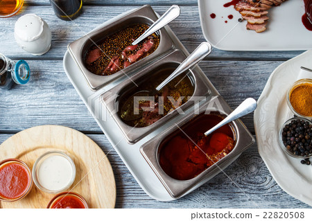 Liquid with pieces of meat. Liquid with pieces of meat. 22820508