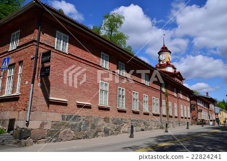 Red brick warehouse with an old clock 22824241