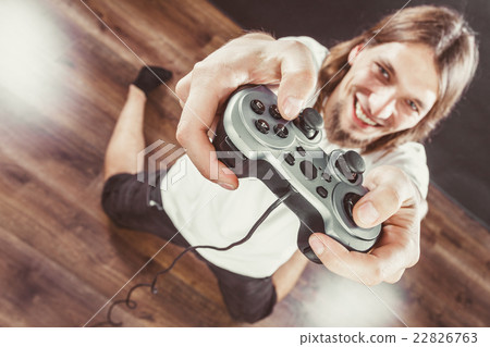 Happy man playing games 22826763