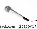 Concert microphone with cord on white background 22829617