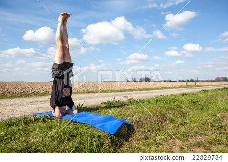 Enjoy Mukta Hasta Sirsasana yoga in Nature Enjoy Mukta Hasta Sirsasana yoga in Nature 22829784