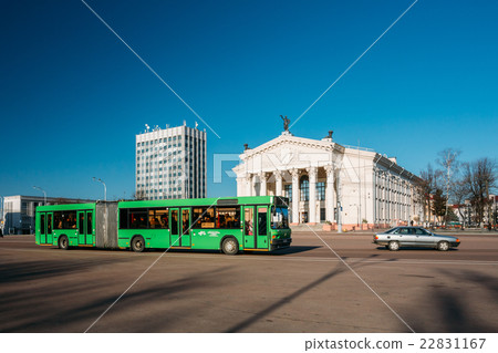 Bus Moving Along Street Near Building Of Gomel Bus Moving Along Street Near Building Of Gomel 22831167