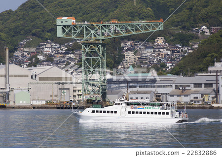 Giant cantilever crane and pleasure boat 22832886