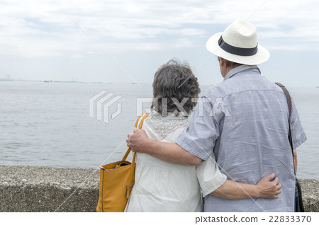 Senior couple looking at the sea Senior couple looking at the sea 22833370