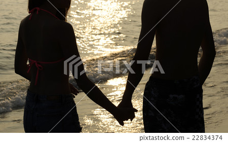 Couple snuggly at the sunset sea 22834374