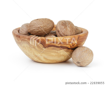 whole dried nutmegs in bowl whole dried nutmegs in bowl 22839055