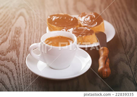 espresso with baguette slices with chocolate cream 22839335