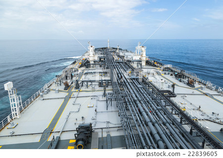 Big grey oil tanker underway in the open sea. Big grey oil tanker underway in the open sea. 22839605