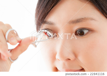 A woman using a bureaus 22841116