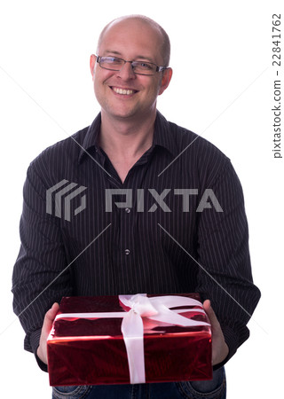 caucasian guy gives a gift isolated on white 22841762