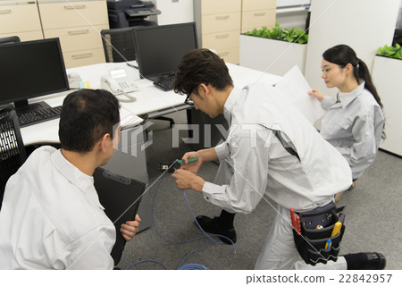 Engineer making LAN work Engineer making LAN work 22842957