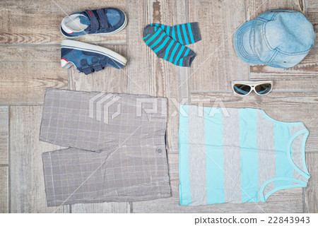 Flat lay photography of boy's casual outfit. 22843943