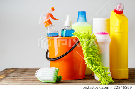 Bucket with cleaning items on light background Bucket with cleaning items on light background 22846599