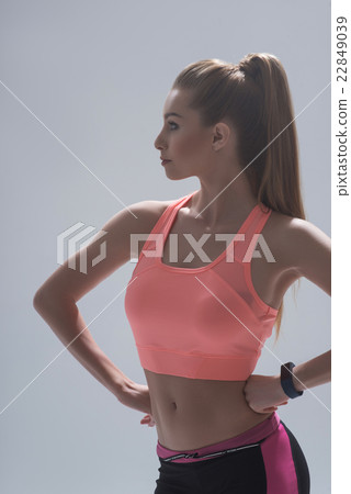 Beautiful female athlete is ready for training 22849039
