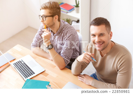 Young guys studying for exams at home Young guys studying for exams at home 22850981