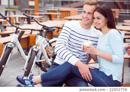 Man and woman sitting at the cafe 22852739