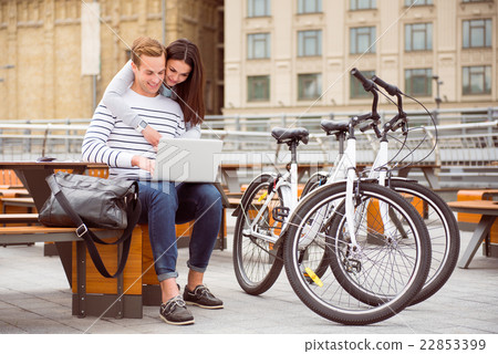Man and woman looking at laptop Man and woman looking at laptop 22853399