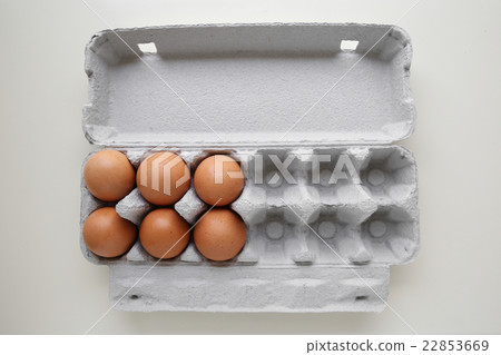 Eggs in package missing eggs, half empty half full 22853669