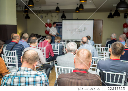 Meeting in a conference hall. 22853815