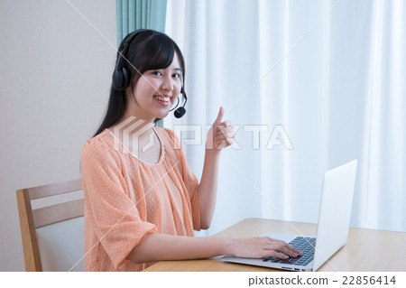 School girls in private clothes (PC, Internet learning, headset) 22856414