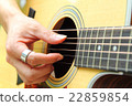 Finger picking the guitar 22859854