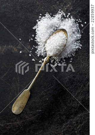 silver spoon with white salt 22859937