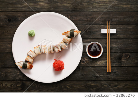 Set of sushi maki and rolls at black rustic wood. 22863270