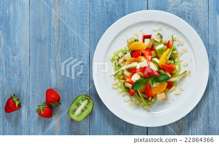 Stock Photo: Fruit salad closeup, vegan food.