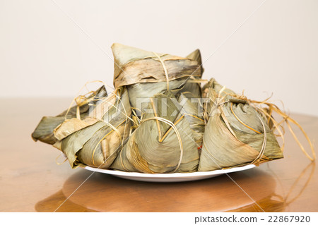 Traditional Duanwu Chinese rice dumplings on plate 22867920