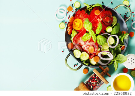 Fresh salad on blue background 22868982