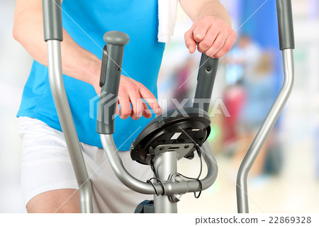 Man doing healthy Fitness with a Exercise Machine 22869328