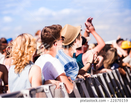 Teenagers at summer music festival, at the barrier Teenagers at summer music festival, at the barrier 22870159