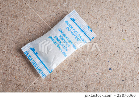 Close up silica gel or desiccant in paper bag Close up silica gel or desiccant in paper bag 22876366