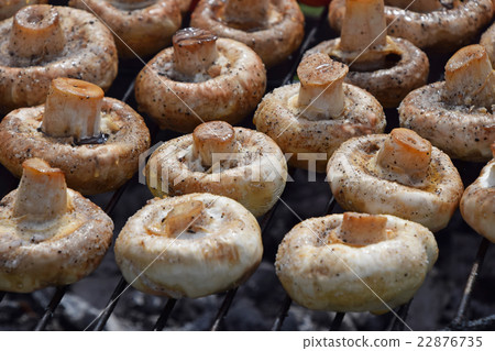 White champignons mushrooms on grill White champignons mushrooms on grill 22876735