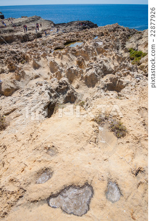 Salt crystallizes on the rocks at the Azure Window 22877926