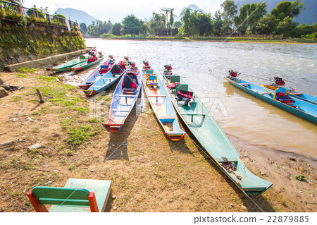 Boats at the Nam Song river in Vang Vieng, Laos. Boats at the Nam Song river in Vang Vieng, Laos. 22879885