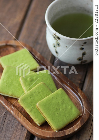 Matcha langue de chat cookies and hot green tea Matcha langue de chat cookies and hot green tea 22881213