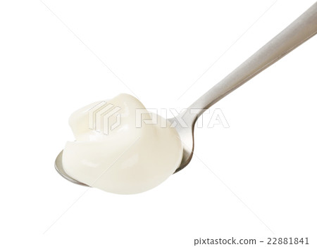 White yogurt on a spoon 22881841