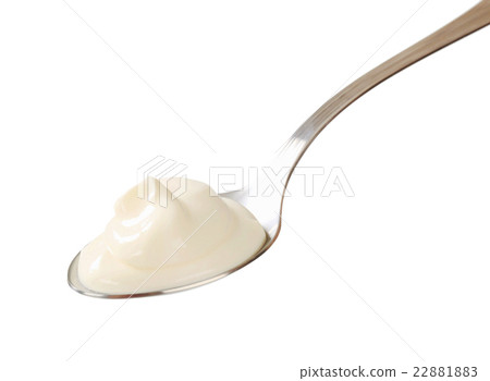 Plain yogurt on a spoon Plain yogurt on a spoon 22881883