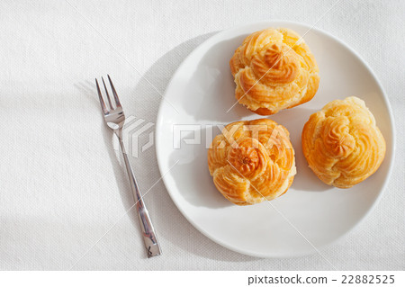 Profiteroles, choux with cream, anglaise dessert Profiteroles, choux with cream, anglaise dessert 22882525